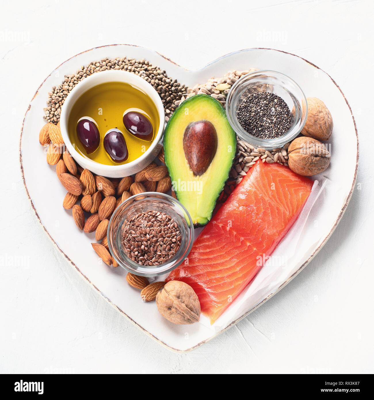 Selection of healthy fat sources. Healthy dieteating concept.Top view ...