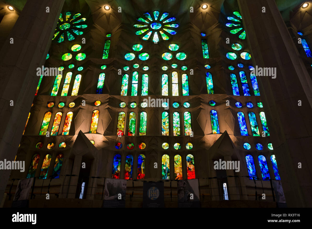 The stunning interior atrium and stained glass of Antonio Gaudi's Sagrada Familia church in Barcelona, Spain. Stock Photo