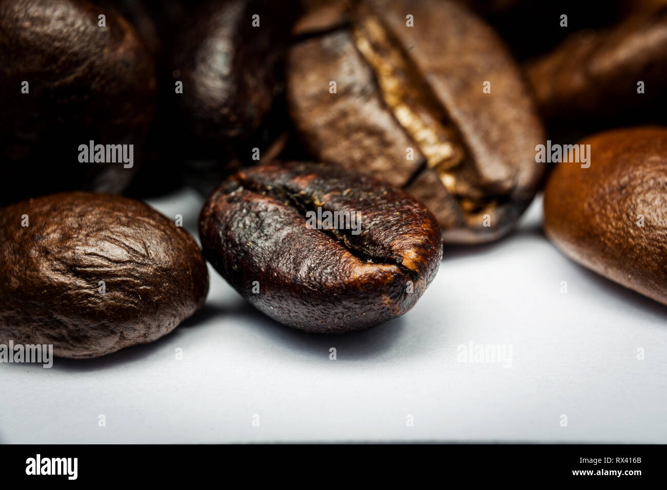Black Coffee beans close-up extreme macro photography Stock Photo - Alamy