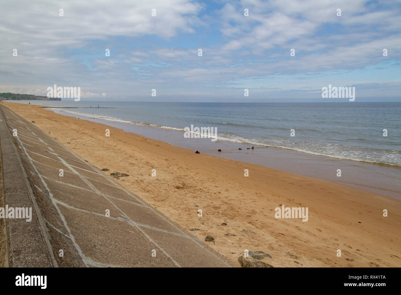 View along Omaha Beach towards Vierville-Sur-Mer in Normandy, France. Stock Photo