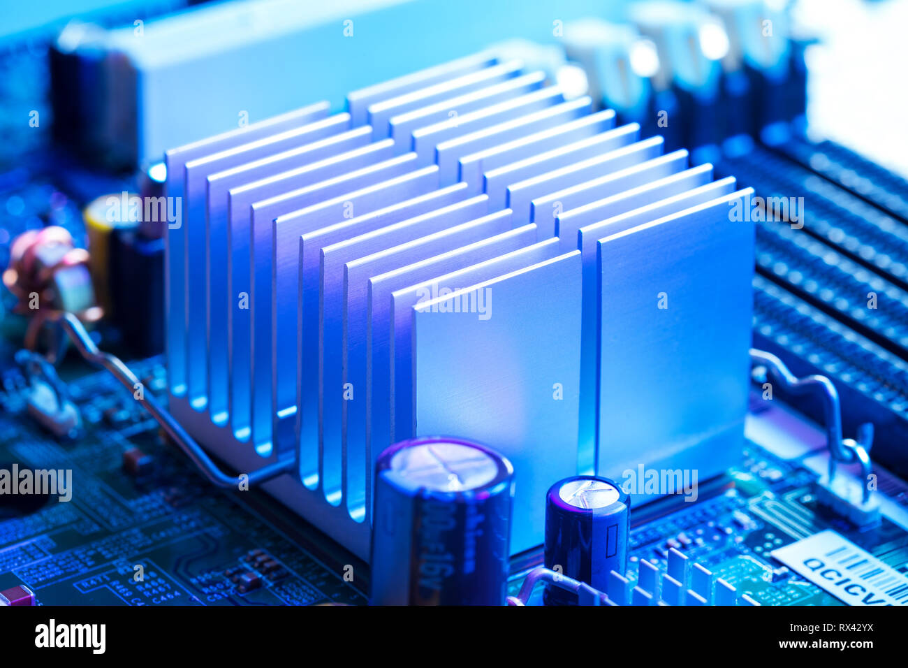 Close Up Aluminum heatsink on a computer motherboard Stock Photo Alamy