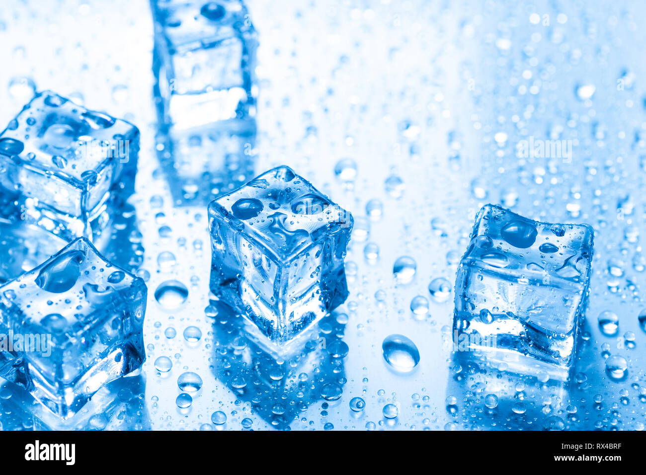 Ice cubes with water drops Stock Photo
