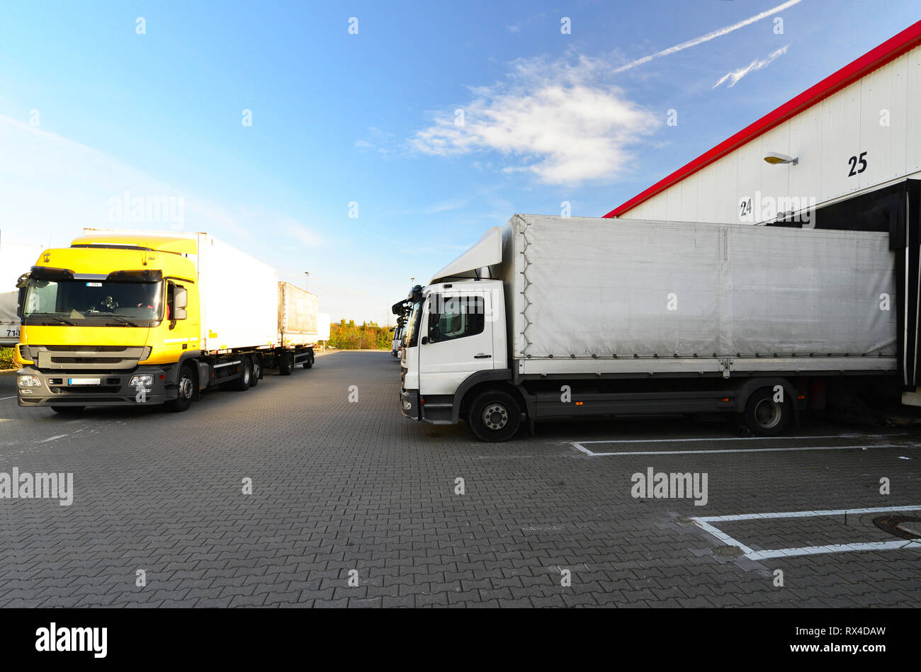 logistics and goods storage - loading and unloading of goods for transport by truck Stock Photo