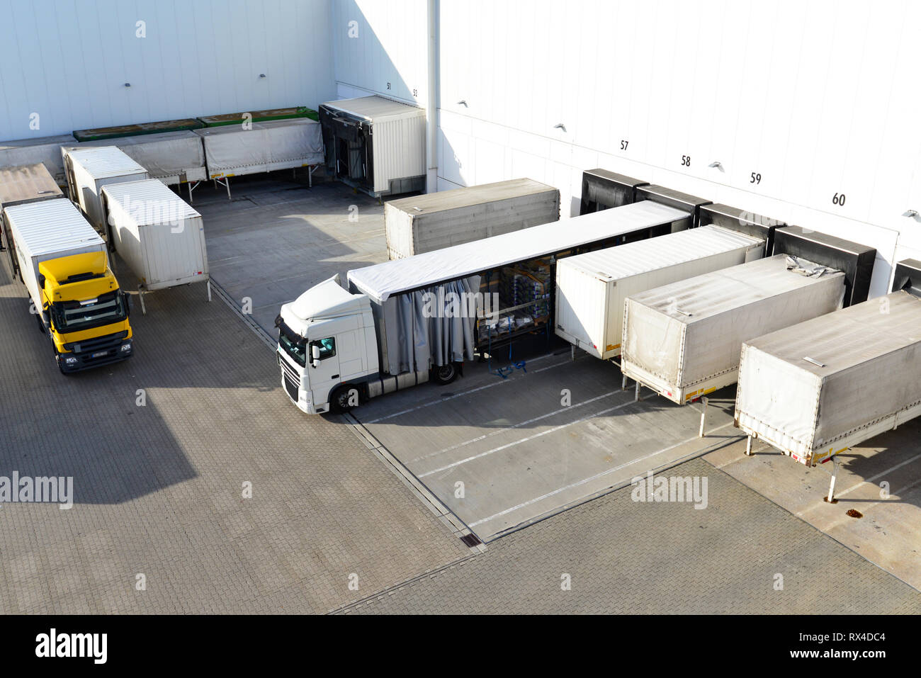 loading of lorries at the warehouse of a freight forwarding company Stock Photo