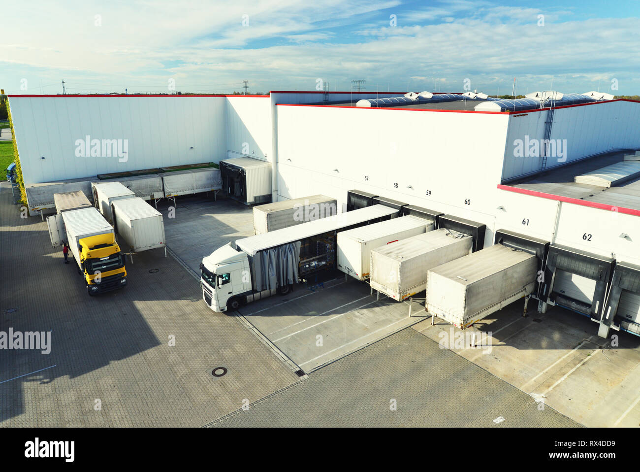 logistics and goods storage - loading and unloading of goods for transport by truck Stock Photo