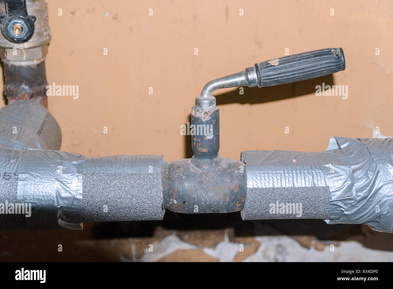 Adjustable gate valve on home heating system Stock Photo Alamy