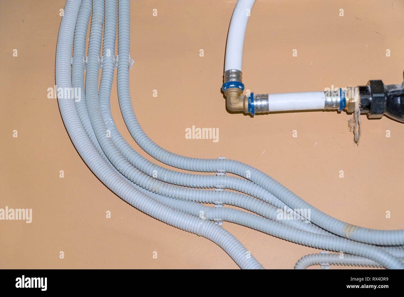 Connection of plastic pipes through fittings Stock Photo Alamy