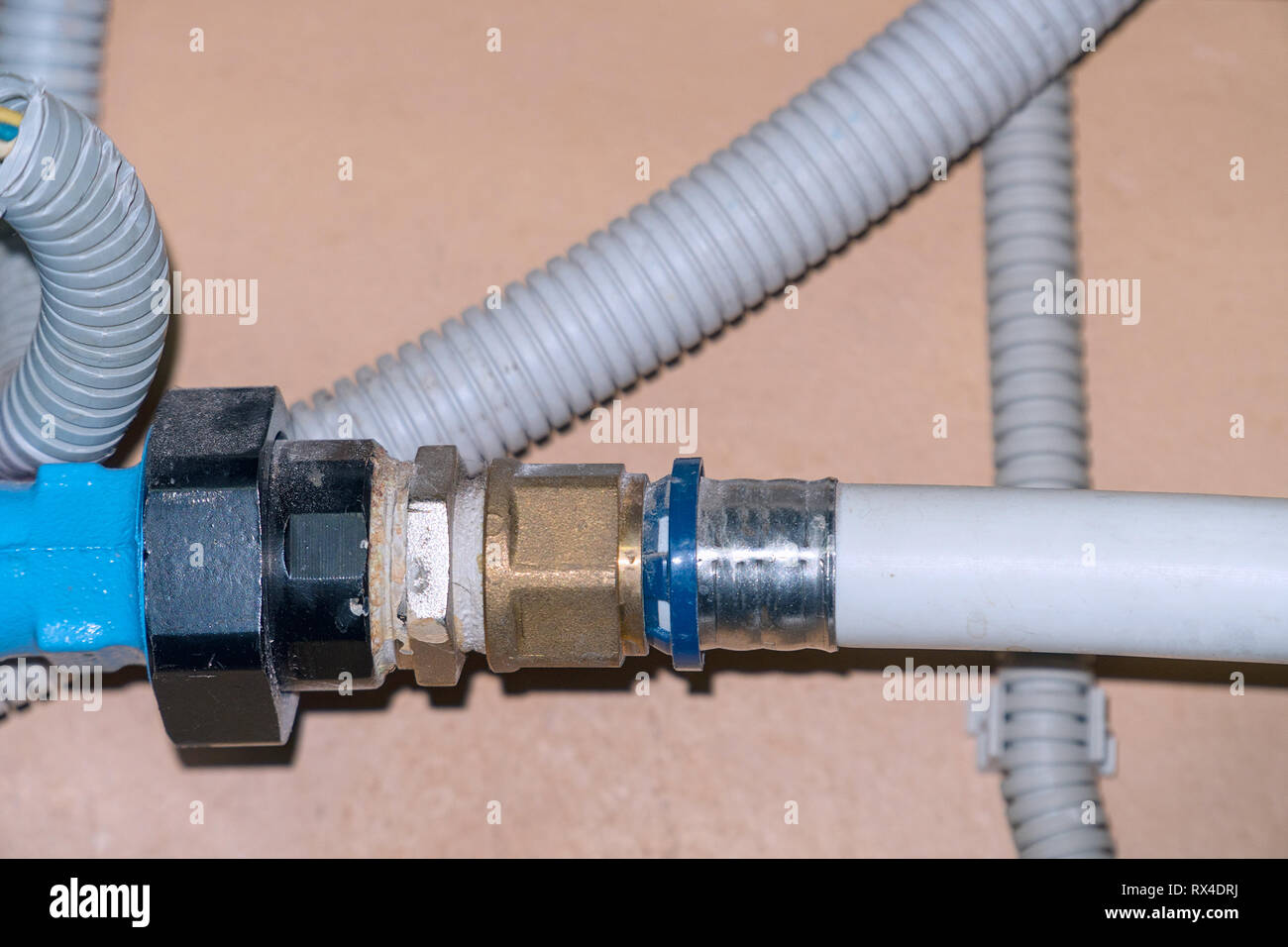 Connection of plastic pipes through the coupling Stock Photo Alamy