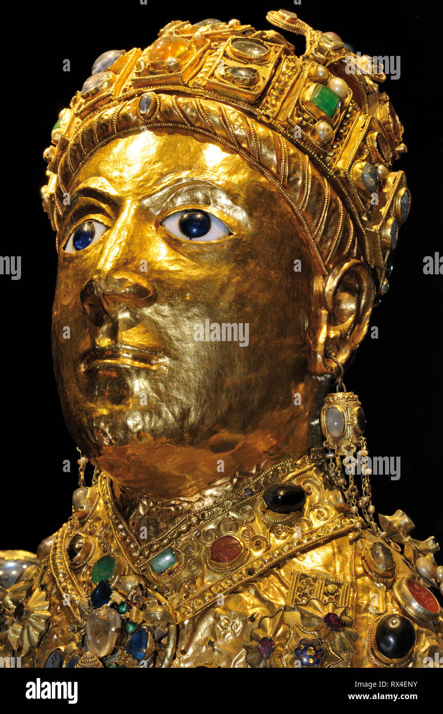 Golden bust decorated with diamonds and precious stones Stock Photo