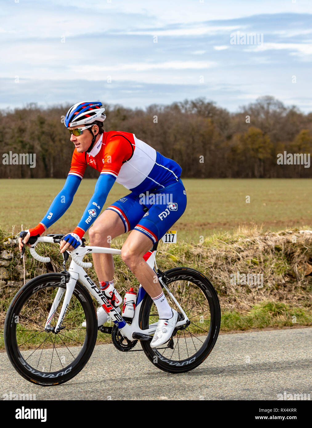Fains-la-Folie, France - March 5, 2018: The Dutch cyclist Ramon Sinkeldam of Team Groupama-FDJ, riding on a country road during the stage 2 of Paris-N Stock Photo