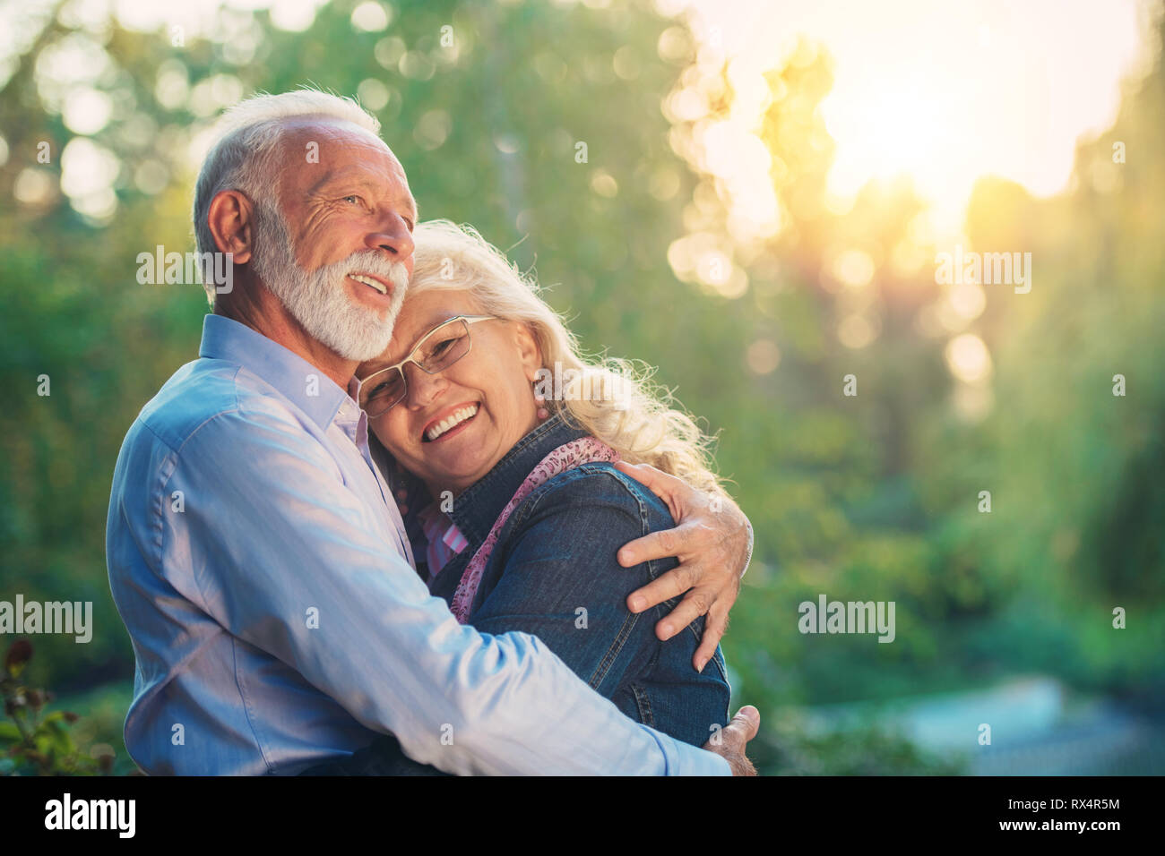 Happy senior couple in love. Park outdoors Stock Photo - Alamy