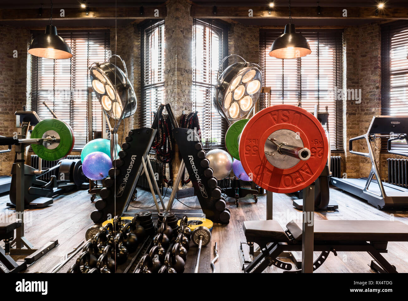Exercise equipment in rustic gym Stock Photo