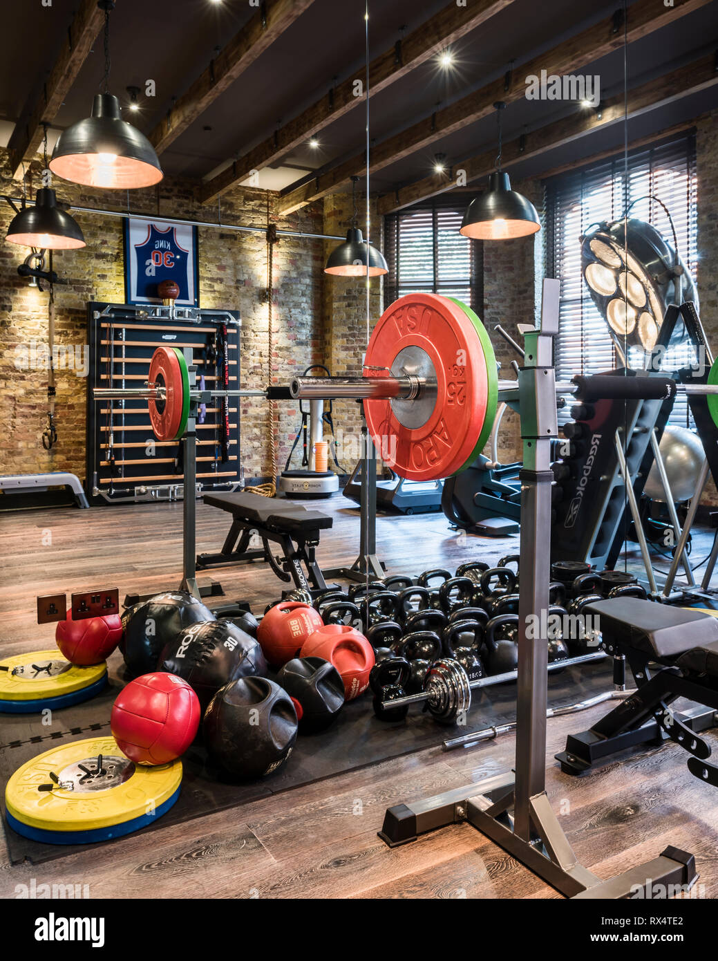 Exercise equipment in rustic gym Stock Photo