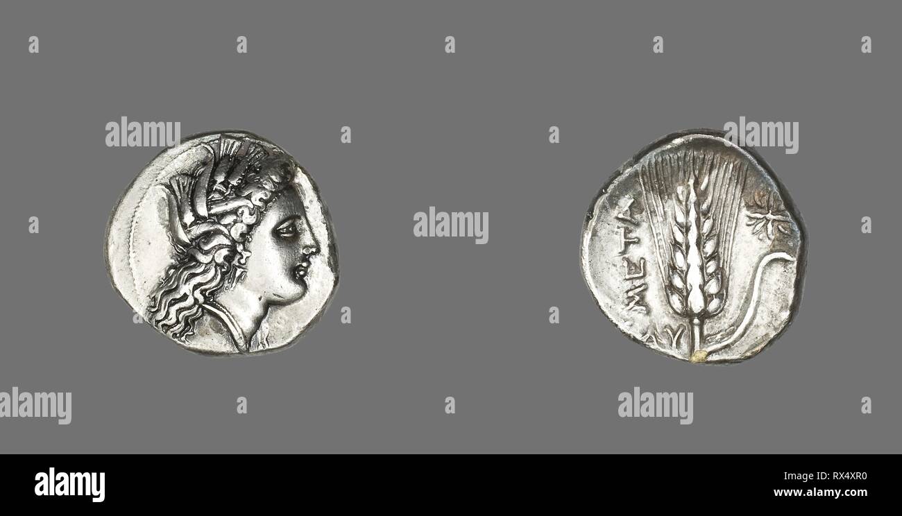 Stater (Coin) Depicting the Goddess Kore. Greek, minted in Metapontum, Italy. Date: 330 BC-300 BC. Dimensions: Diam. 2.1 cm; 7.65 g. Silver. Origin: Metapontum. Museum: The Chicago Art Institute. Author: ANCIENT GREEK. Stock Photo