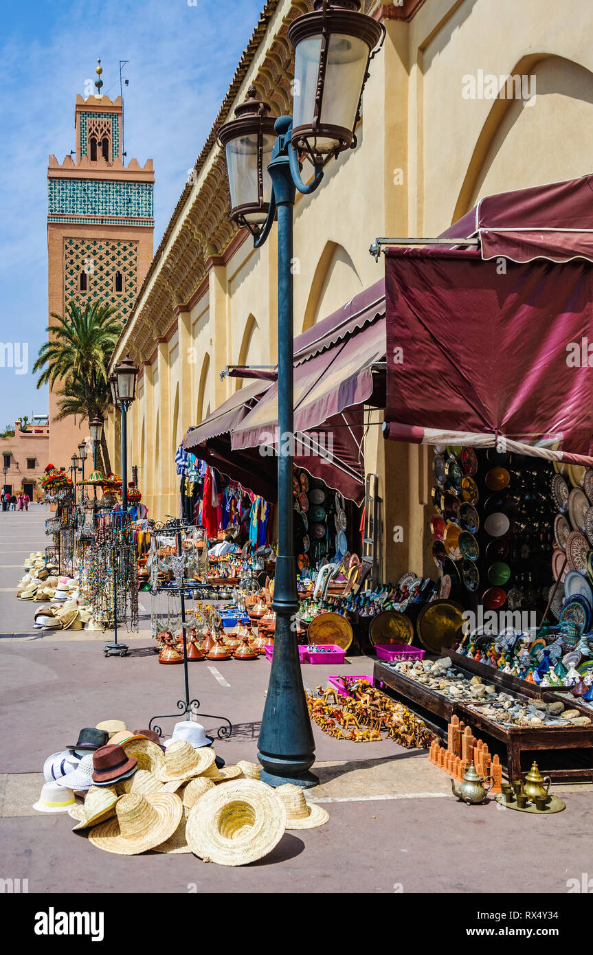 Souvenir shops in front of Moulay El yazid Mosque in the Medina of Marrakech, Morocco Stock Photo