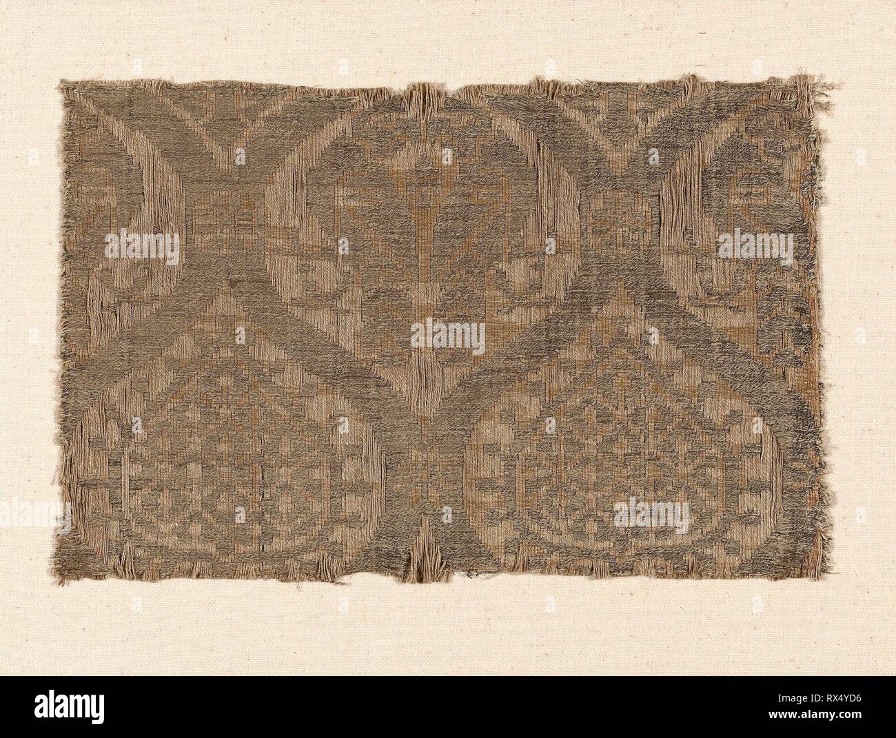 Fragment. Spain or Italy or Germany. Date: 1201-1300. Dimensions: 16.8 x 26.1 cm (6 5/8 x 10 1/4 in.). Silk, linen, and gilt animal substrate wrapped linen, two-color complementary weft, weft-float faced twill weave with inner warps. Origin: Spain. Museum: The Chicago Art Institute. Stock Photo