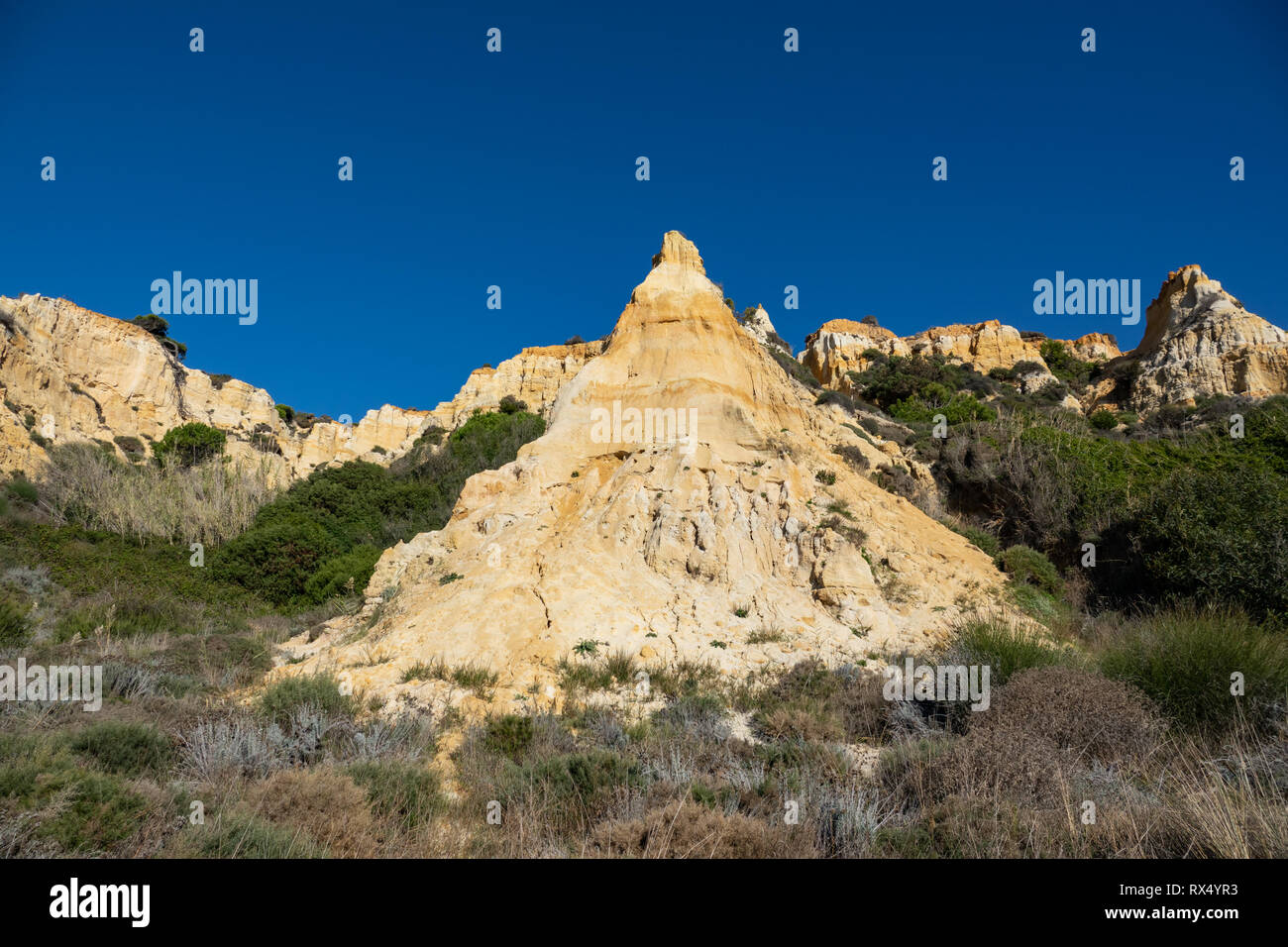 Pyramid shape in the hillside of the mountain Stock Photo Alamy