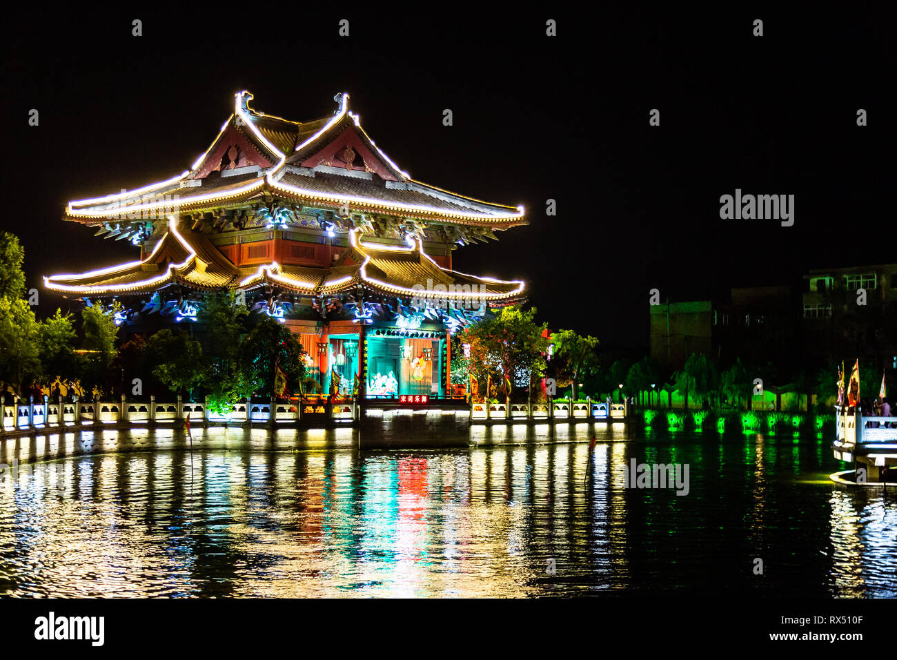Qingming riverside in Kaifeng, known as Shui Xi , is beautifully lighted a night. Kaifeng was the capital of the Song Dynasty, 1000 to 1100AD Stock Photo