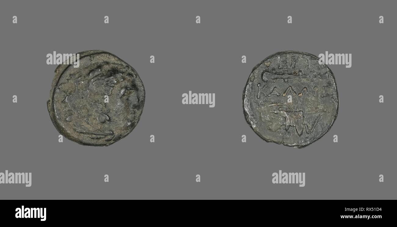 Coin Depicting the Hero Herakles. Greek. Date: 400 BC-301 BC. Dimensions: Diam. 1.5 cm; 3.06 g. Bronze. Origin: Ancient Greece. Museum: The Chicago Art Institute. Stock Photo