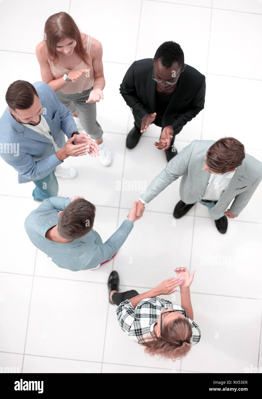 Aerial meeting table handshake hi-res stock photography and images - Alamy