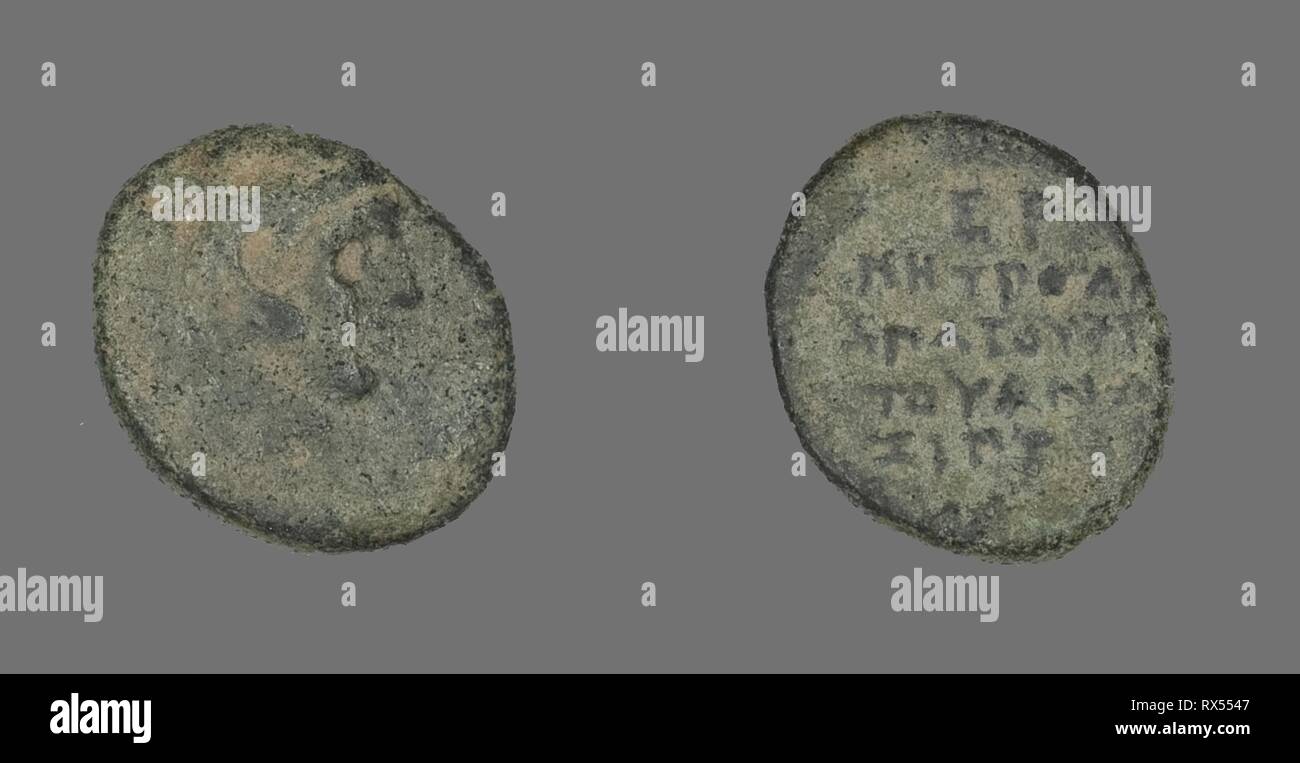 Coin Depicting the Hero Herakles. Greek. Date: 300 BC-200 BC. Dimensions: Diam. 1.4 cm; 1.62 g. Bronze. Origin: Ancient Greece. Museum: The Chicago Art Institute. Stock Photo