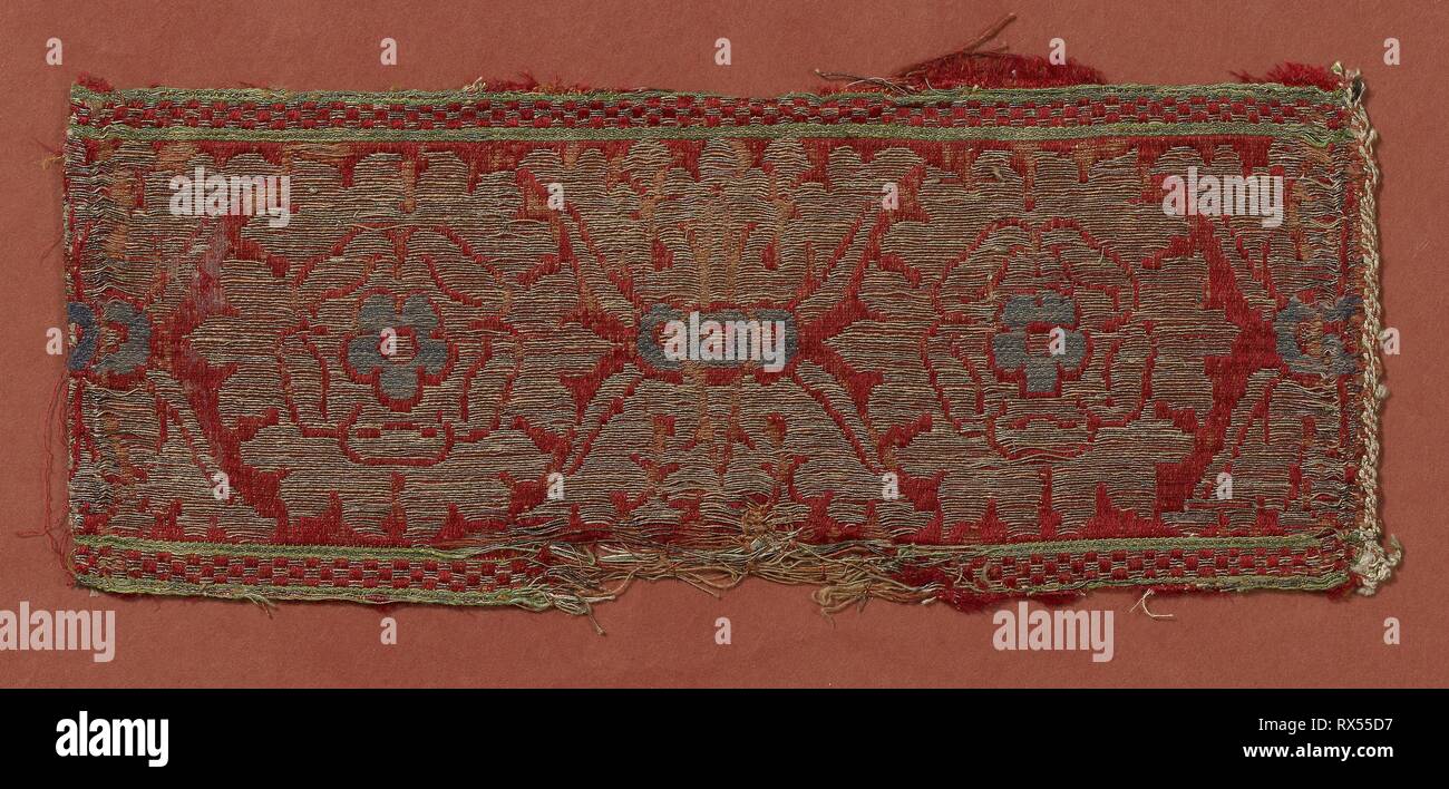 Border. Italy. Date: 1401-1500. Dimensions: 11.6 x 27.1 cm (4 1/2 x 10 5/8 in.). Silk, gold gilt strip wound around linen fiber core, warp-float faced satin weave with supplementary patterning wefts tied by supplementary binding warps in twill interlacing. Origin: Italy. Museum: The Chicago Art Institute. Stock Photo