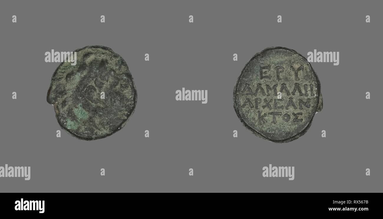 Coin Depicting the Hero Herakles. Greek. Date: 300 BC-200 BC. Dimensions: Diam. 1.5 cm; 3.54 g. Bronze. Origin: Ancient Greece. Museum: The Chicago Art Institute. Stock Photo