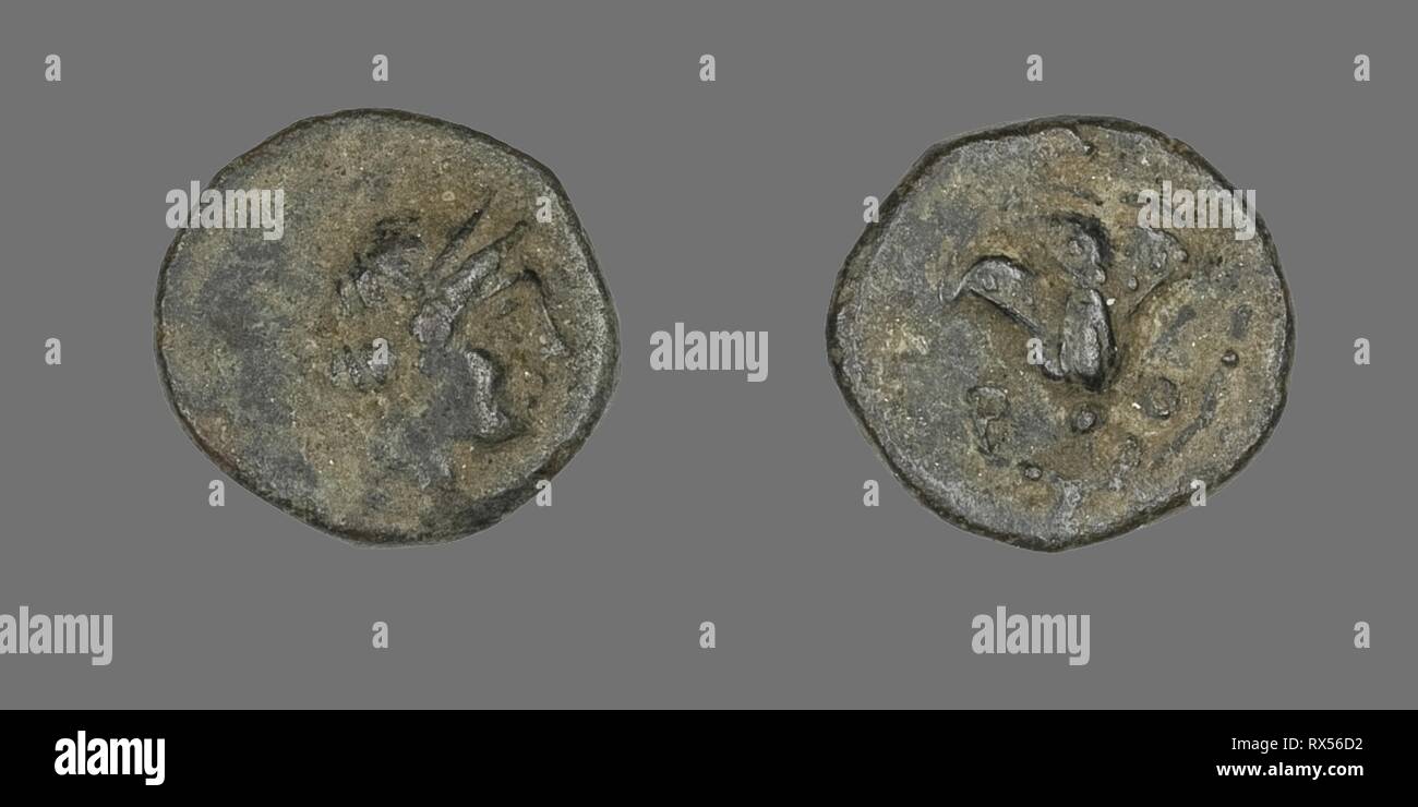 Coin Depicting the Goddess Rhodos. Greek. Date: 333 BC-304 BC. Dimensions: Diam. 1.2 cm; 1.13 g. Bronze. Origin: Ancient Greece. Museum: The Chicago Art Institute. Stock Photo