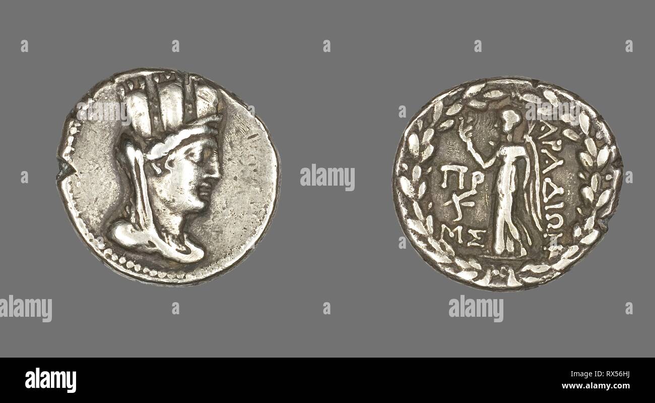 Tetradrachm (Coin) Depicting the Goddess Tyche. Greco-Roman; Arados, Phoenicia. Date: 80 BC-79 BC. Dimensions: Diam. 2.8 cm; 13.49 g. Silver. Origin: Aradus. Museum: The Chicago Art Institute. Author: ANCIENT GREEK. Stock Photo