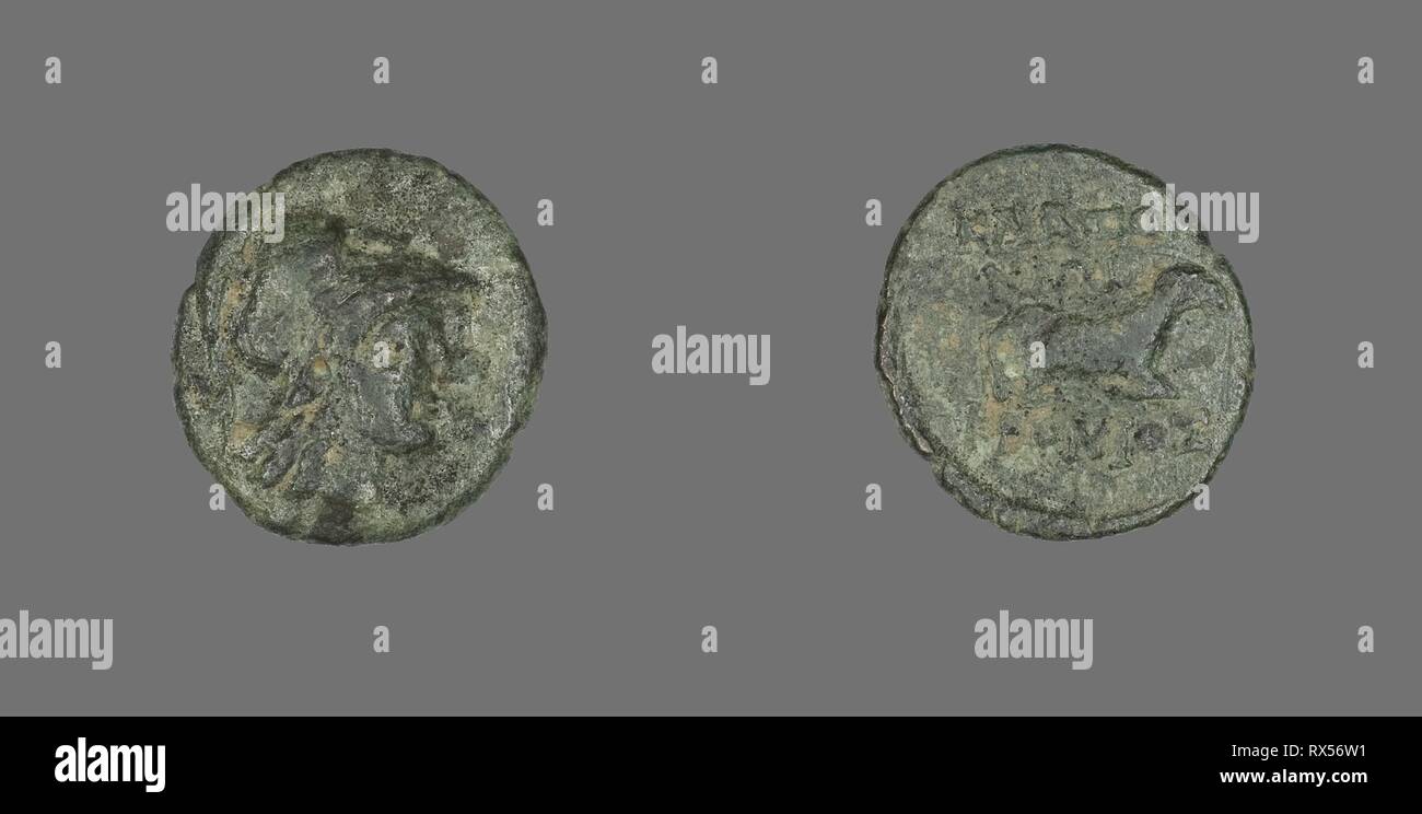 Coin Depicting the Goddess Athena. Greek. Date: 387 BC-301 BC. Dimensions: Diam. 1.8 cm; 2.95 g. Bronze. Origin: Ancient Greece. Museum: The Chicago Art Institute. Stock Photo