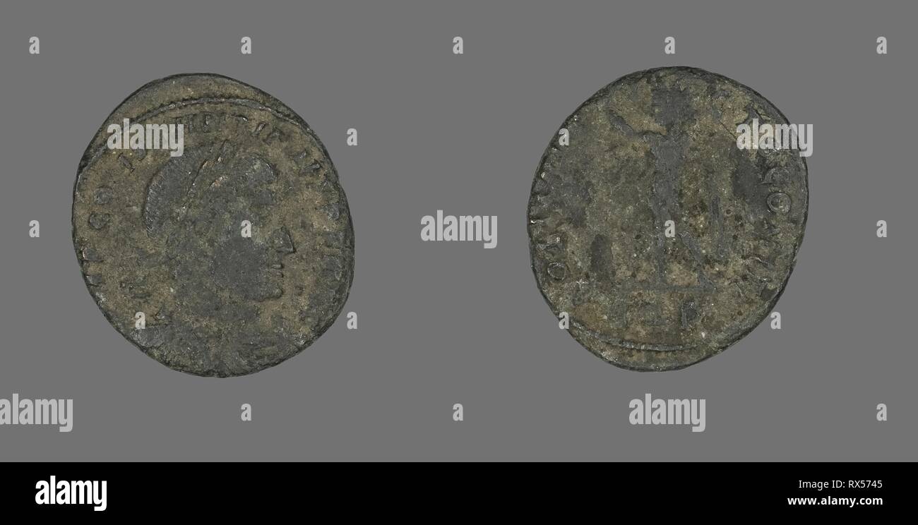 Coin Portraying Emperor Constantine I. Roman, minted in Aquileia. Date: 317 AD. Dimensions: Diam. 2.1 cm; 2.70 g. Bronze. Origin: Roman Empire. Museum: The Chicago Art Institute. Author: ANCIENT ROMAN. Stock Photo