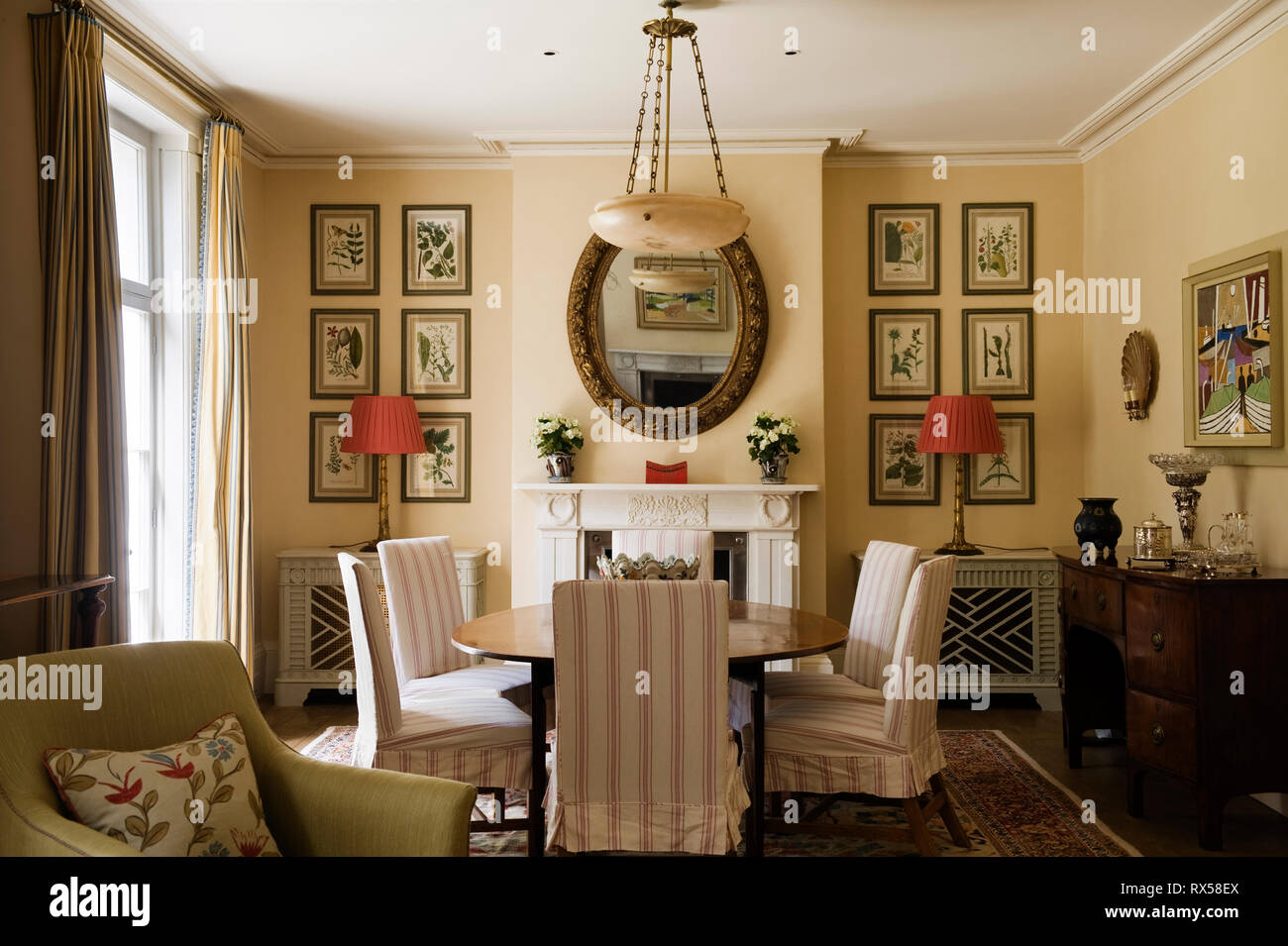 Country style dining room with striped chairs Stock Photo Alamy