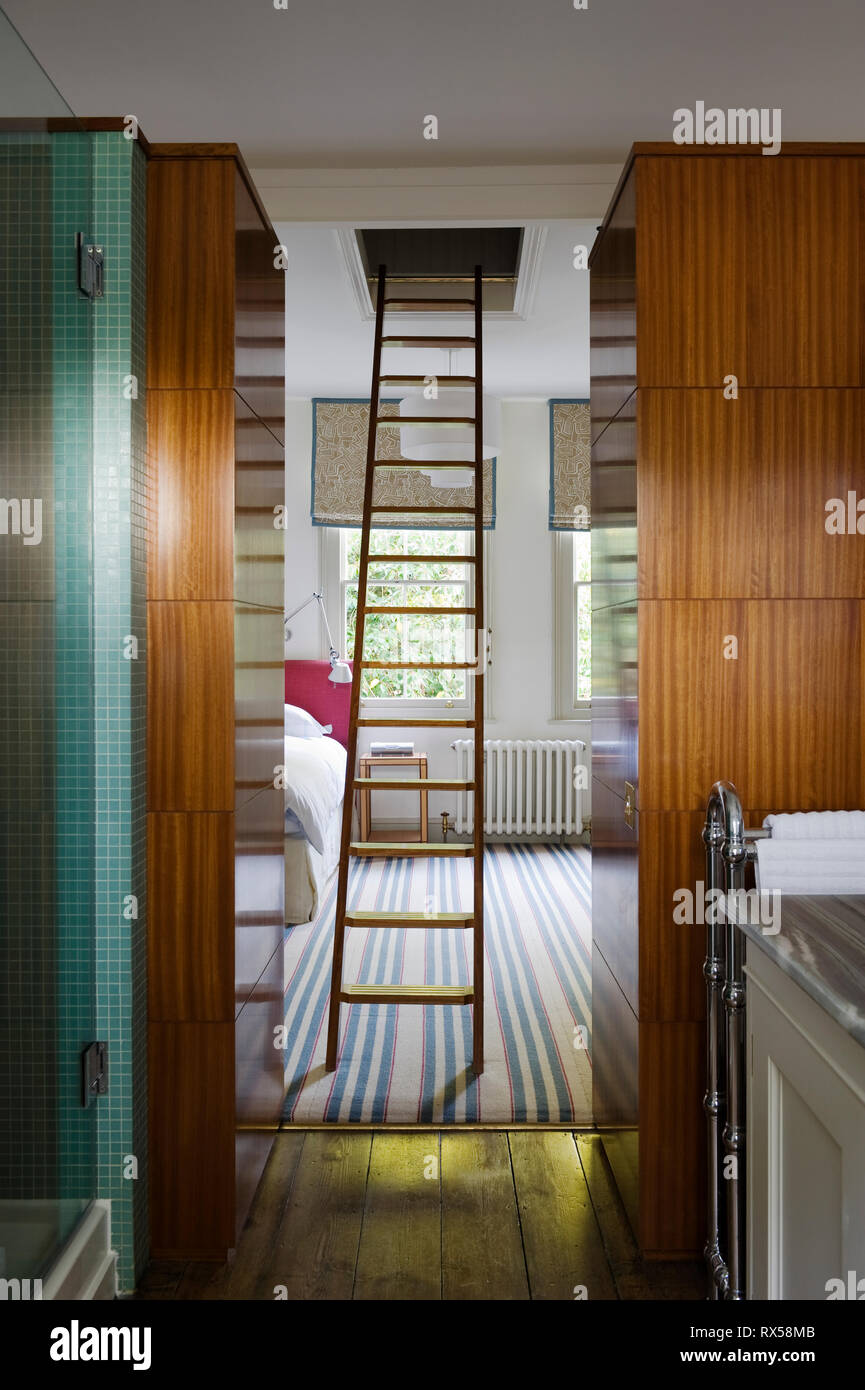 Ladder in bedroom with ensuite Stock Photo
