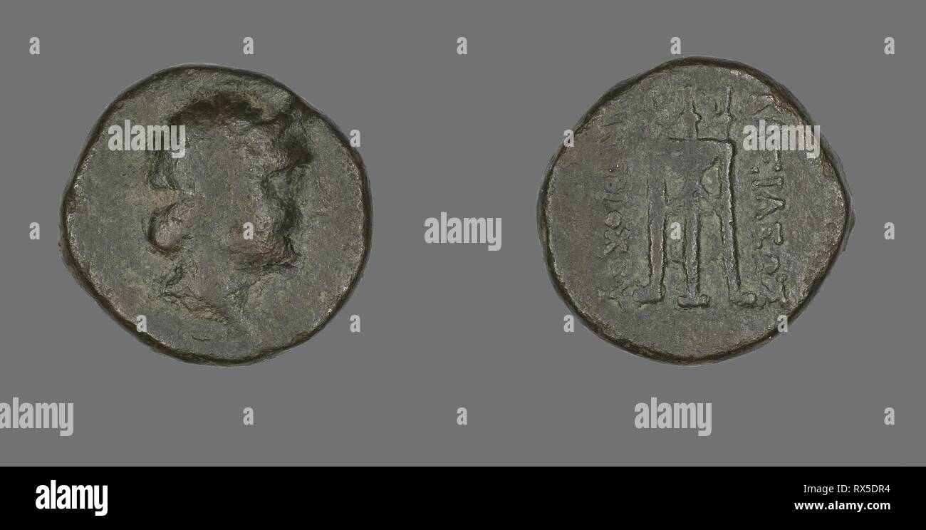 Coin Depicting a Goddess. Greek. Date: 261 BC-246 BC. Dimensions: Diam. 2.1 cm; 8.43 g. Bronze. Origin: Ancient Greece. Museum: The Chicago Art Institute. Stock Photo