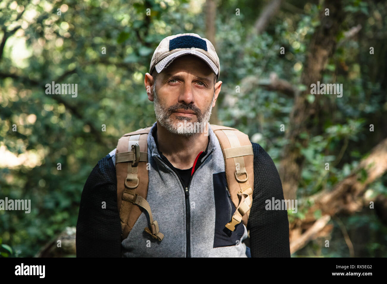 Portrait of an active, confident, middle aged man in the nature, looking to the camera Stock Photo