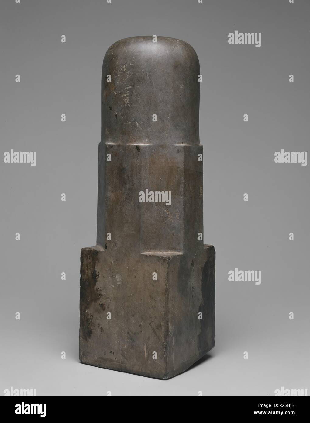 Emblem of the God Shiva (Linga). Cambodia. Date: 901 AD-1300. Dimensions: 46.7 × 14.6 × 14.6 cm (18 3/8 × 5 3/4 × 5 3/4 in.). Sandstone. Origin: Cambodia. Museum: The Chicago Art Institute. Stock Photo