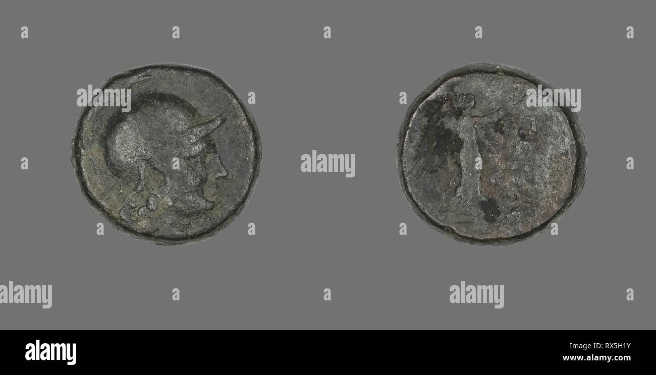 Coin Depicting the Goddess Athena. Greek. Date: 133 BC. Dimensions: Diam. 1.8 cm; 8.67 g. Bronze. Origin: Ancient Greece. Museum: The Chicago Art Institute. Stock Photo