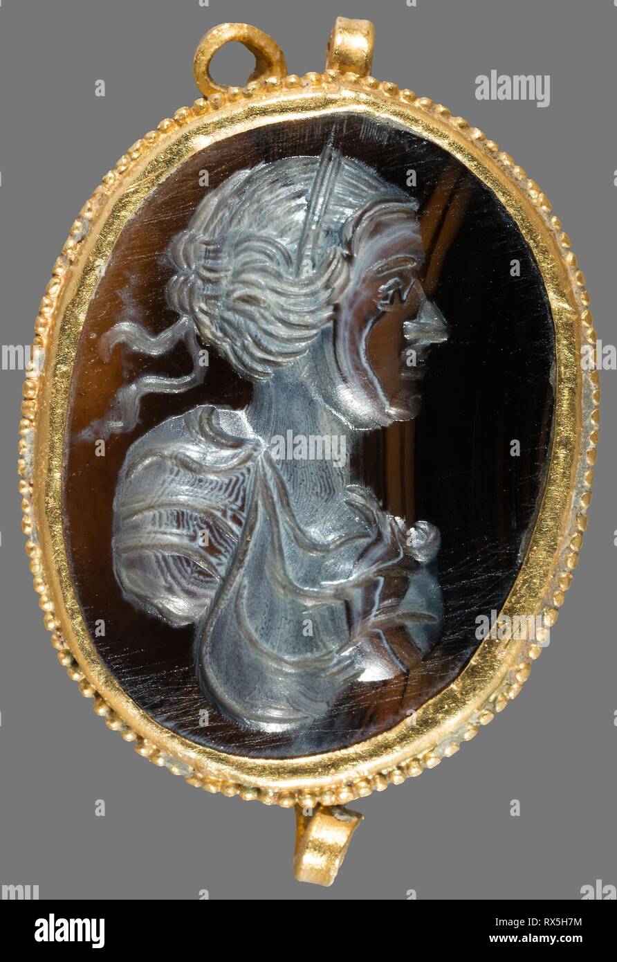 Pendant with an Intaglio of the Head of a Woman. European. Date: 1500-1599. Dimensions: 2.6 × 2.1 cm (1 1/16 × 7/8 in.). Gold and hardstone. Origin: Europe. Museum: The Chicago Art Institute. Stock Photo