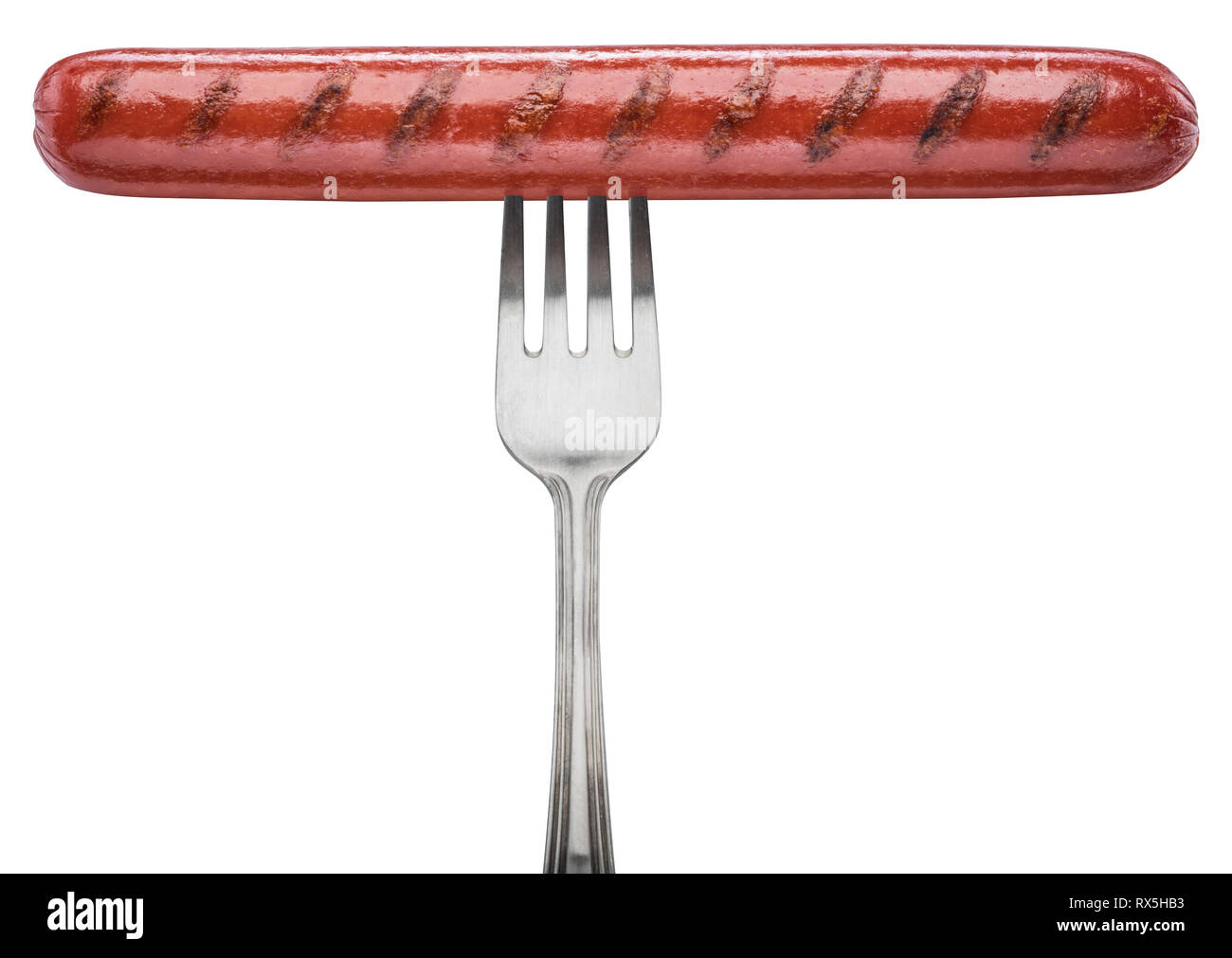Grilled sausage on a fork. File contains clipping path. Stock Photo