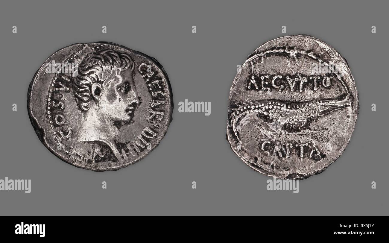 Denarius (Coin) Portraying Octavian. Roman, uncertain mint in the East (Pergamum or Ephesus). Date: 28 BC. Dimensions: Diam. 2.1 cm; 3.52 g. Silver. Origin: Roman Empire. Museum: The Chicago Art Institute. Author: ANCIENT ROMAN. Stock Photo