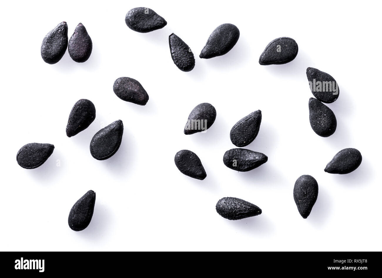 Several black sesame seeds isolated on white background Stock Photo Alamy