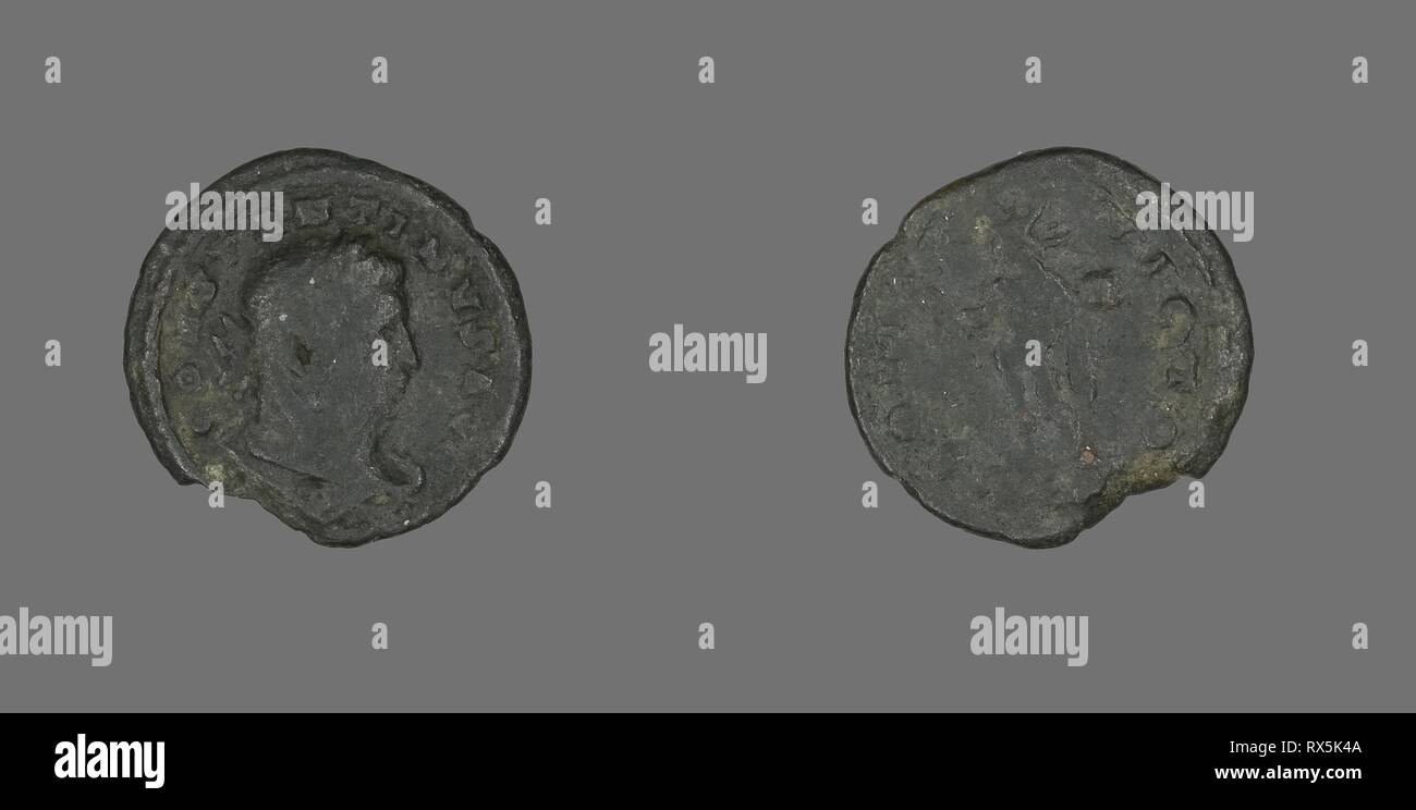 Coin Portraying Emperor Constantine I. Roman, minted in Trier. Date: 310 AD-311 AD. Dimensions: Diam. 1.9 cm; 1.72 g. Bronze. Origin: Roman Empire. Museum: The Chicago Art Institute. Author: ANCIENT ROMAN. Stock Photo