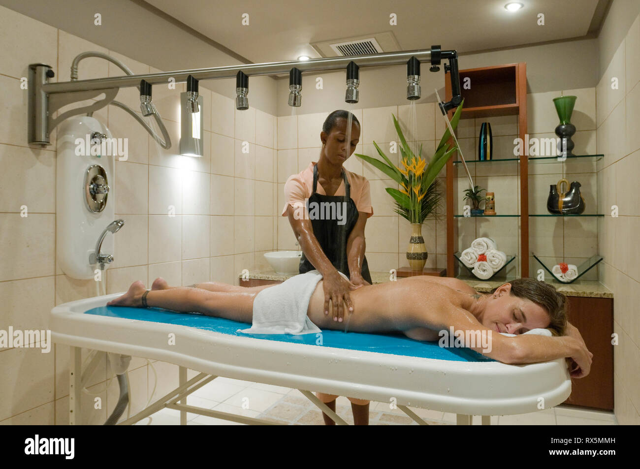 Woman undergoing hydrotherapy at resort Stock Photo