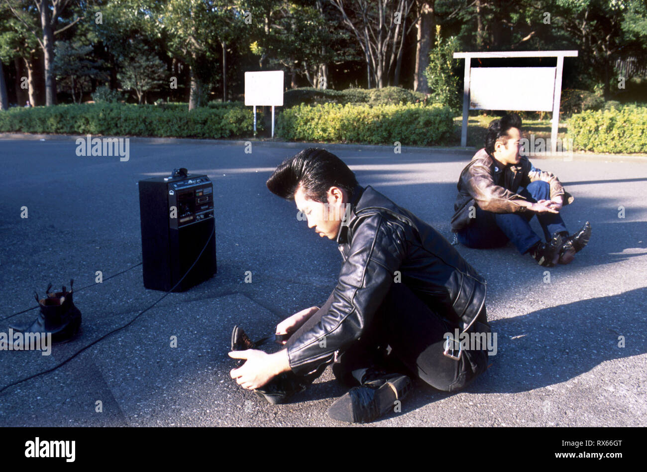 A Japanese rockabilly tapes up his Chelsea boots in preparation for ...