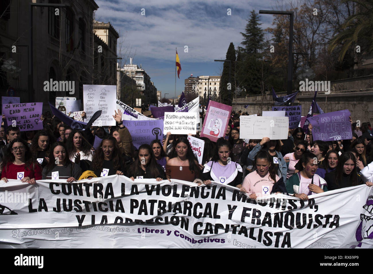 March 8, 2019 - Granada, Granada, Spain - Students seen with a banner and placards along Gran Via street during the strike..Spanish people celebrate International Women's Day with a women's general strike against gender violence. (Credit Image: © Carlos Gil/SOPA Images via ZUMA Wire) Stock Photo