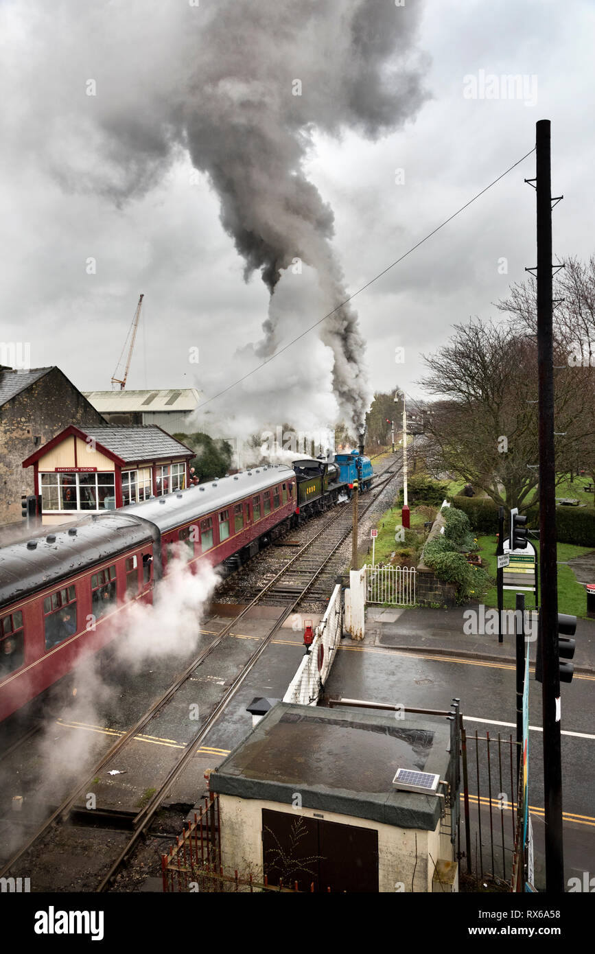 Ramsbottom, Lancashire, UK. 8th Mar 2019. The opening day of the East Lancashire Railway Spring Steam Gala Weekend 2019. Steam enthusiasts brave the rain at Ramsbottom Station, Lancashire. Credit: John Bentley/Alamy Live News Stock Photo