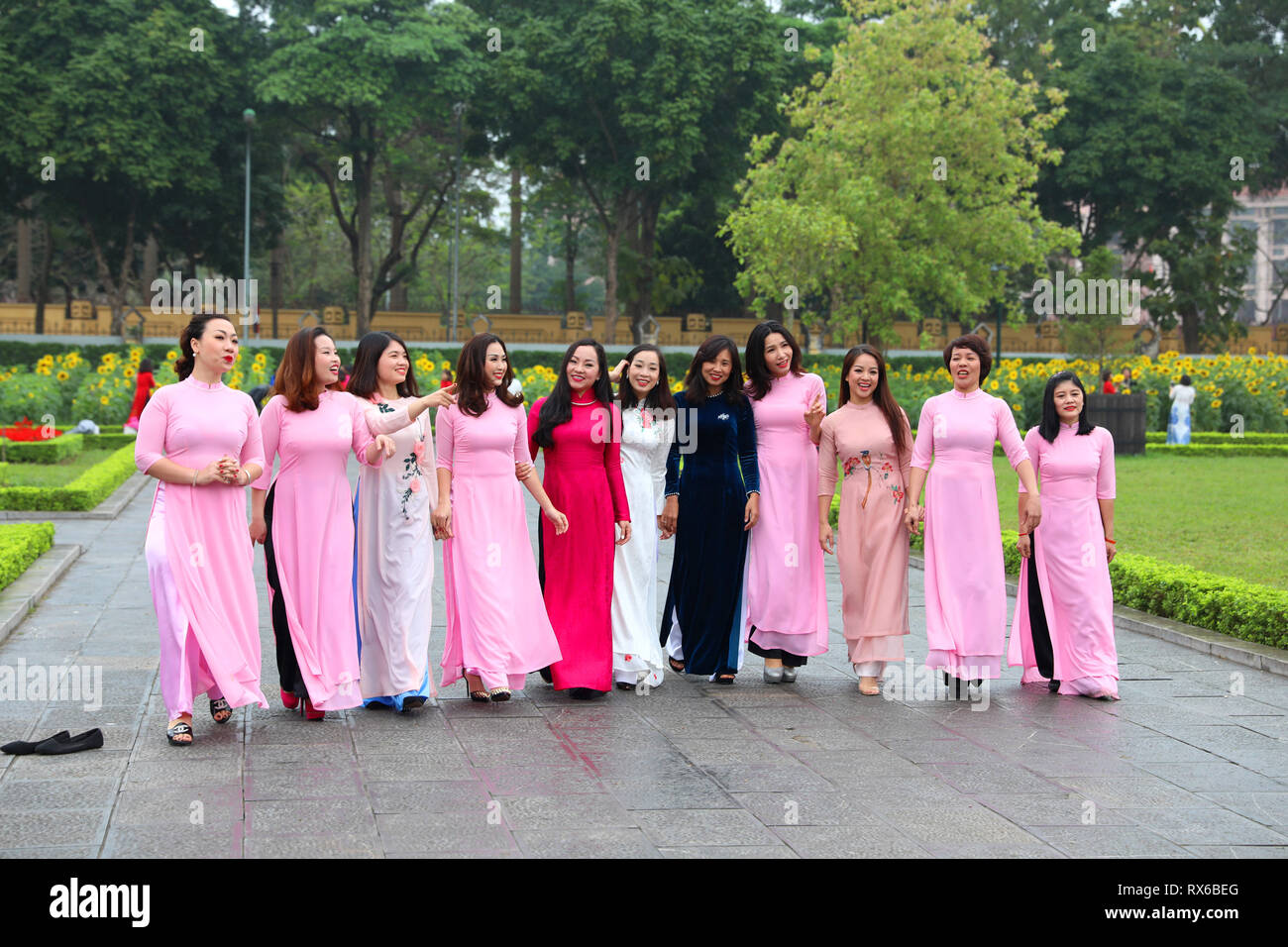 Hanoi Vietnam. 8th Mar 2019. Women wearing Vietnamese traditional costume Ao Dai pose for photos to