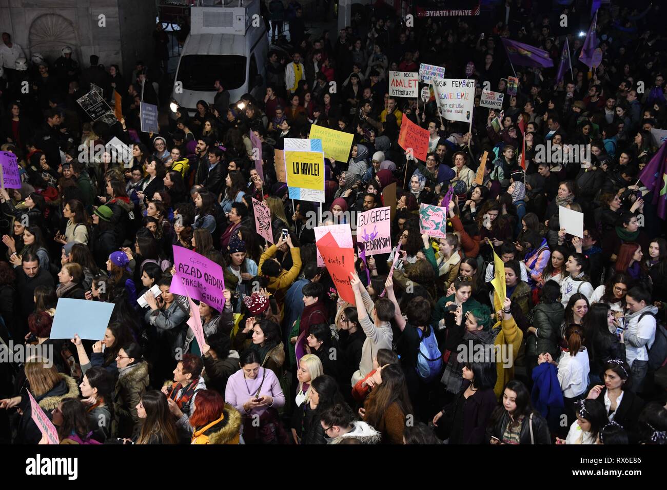 Istanbul, Turkey. 8th Mar, 2019. Women take part in a protest against male violence on Istiklal Street in Istanbul, Turkey, March 8, 2019. Turkish police fired tear gas and rubber bullets to disperse women protesting against male violence at central Istanbul on Friday evening. Credit: Xu Suhui/Xinhua/Alamy Live News Stock Photo