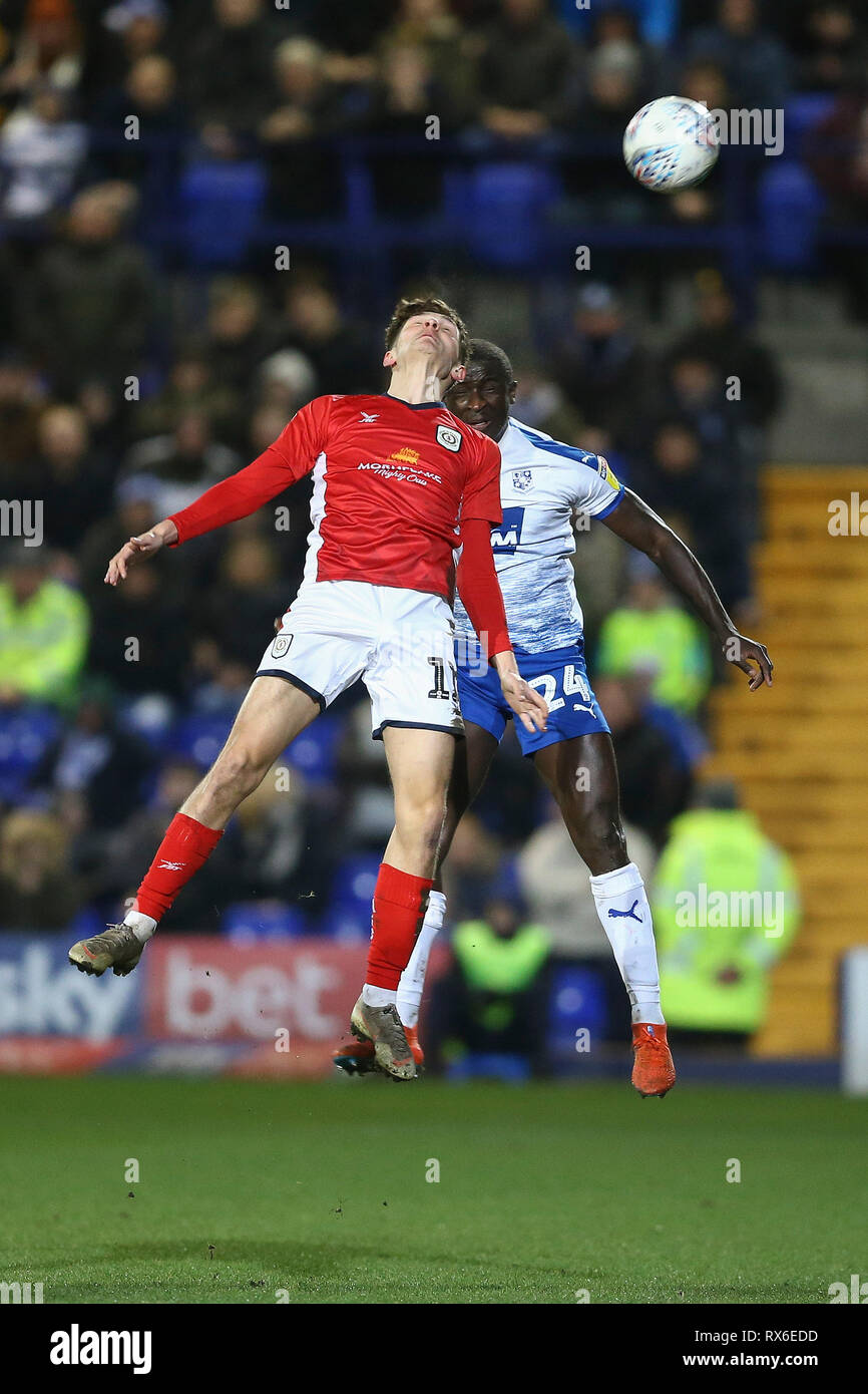 Birkenhead, UK. 08th Mar, 2019. Callum Ainley of Crewe Alexandra (l) and Zoumana Bakayogo of Tranmere Rovers jump for the ball. EFL Skybet Football league two match, Tranmere Rovers v Crewe Alexandra at Prenton Park, Birkenhead, Wirral on Friday 8th March 2019. this image may only be used for Editorial purposes. Editorial use only, license required for commercial use. No use in betting, games or a single club/league/player publications.pic by Chris Stading/Andrew Orchard sports photography/Alamy Live News Credit: Andrew Orchard sports photography/Alamy Live News Stock Photo