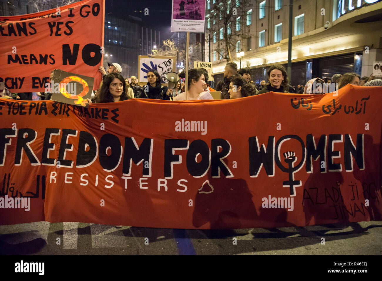Athens, Greece. 8th Mar 2019. Women and men march in the streets of Athens holding banners and shouting slogans against patriarchy. Feminist, leftist and human rights organizations staged a demonstration to honor International Women's Day and demand equal rights and respect. Credit: Nikolas Georgiou/Alamy Live News Stock Photo